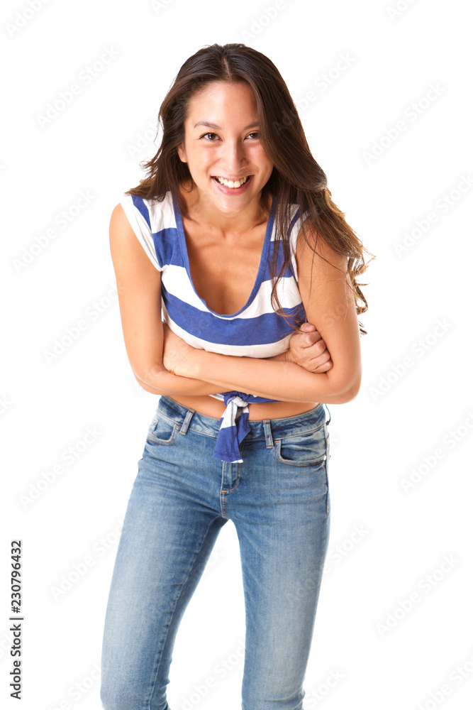 attractive young asian woman laughing with arms crossed against isolated white background attractive young asian woman laughing with arms crossed against isolated white background