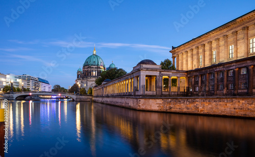 Bode museum illuminated, Spree river, museum island, Berlin, in the evening.