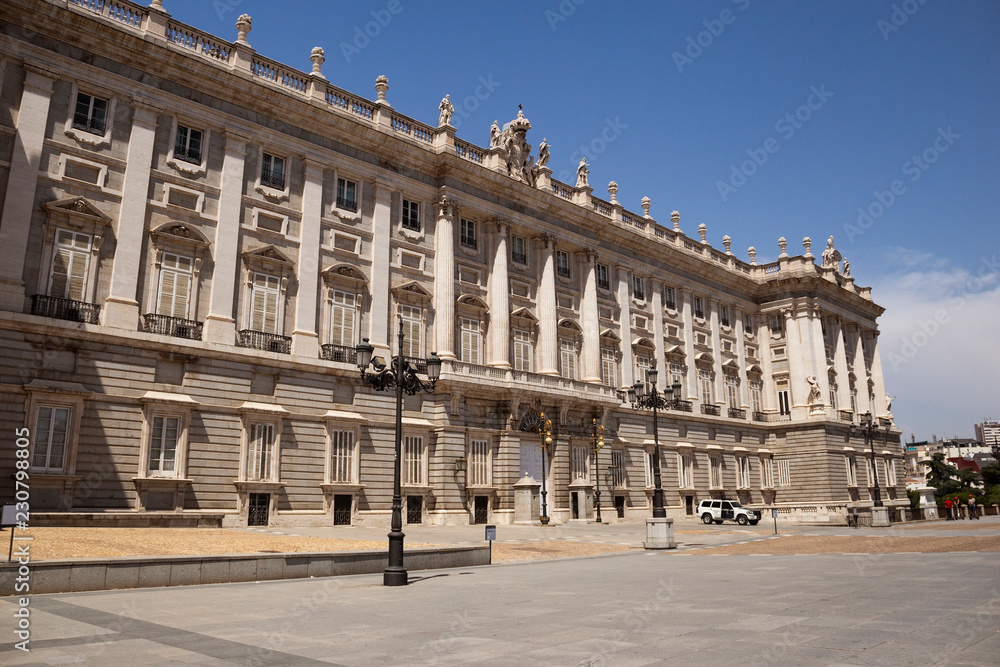 Majestic, beautiful Royal Palace of Madrid (Palacio Real de Madrid) in the center of the city in the sun rays