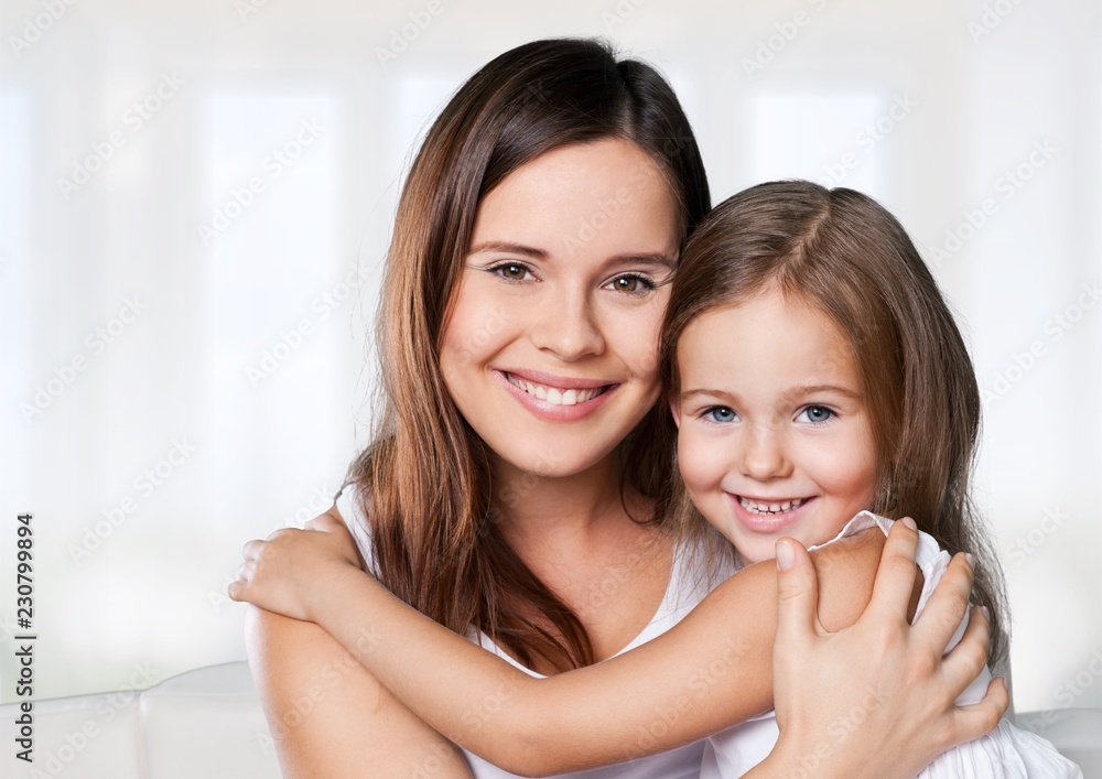 Happy Mother and daughter hugging Happy Mother and daughter hugging