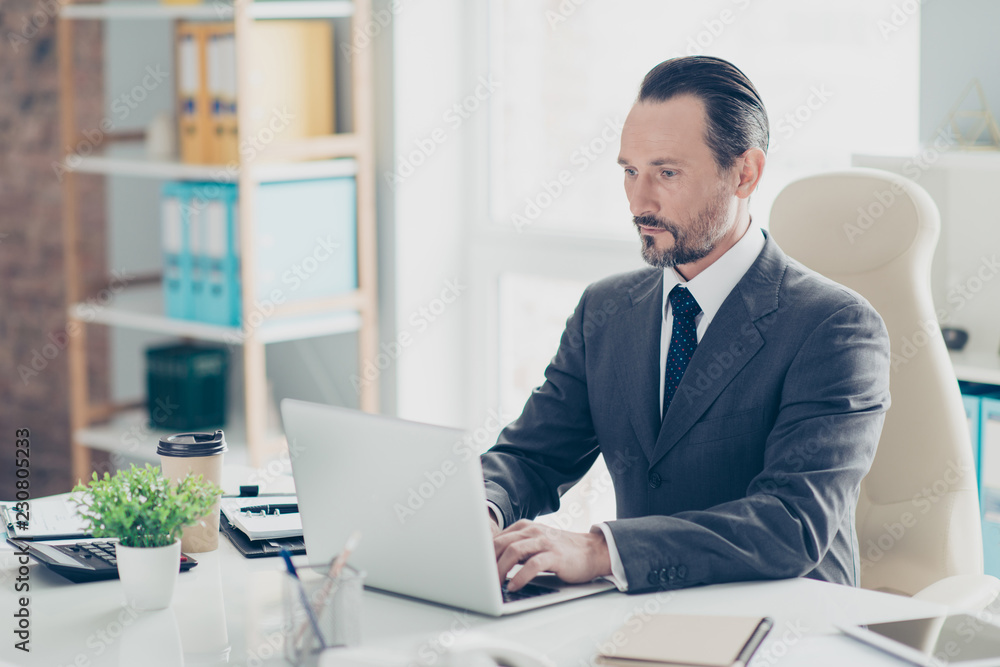 Good-looking attractive focused imposing elegant classy man in f