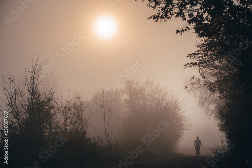 Autumn morning. Man running