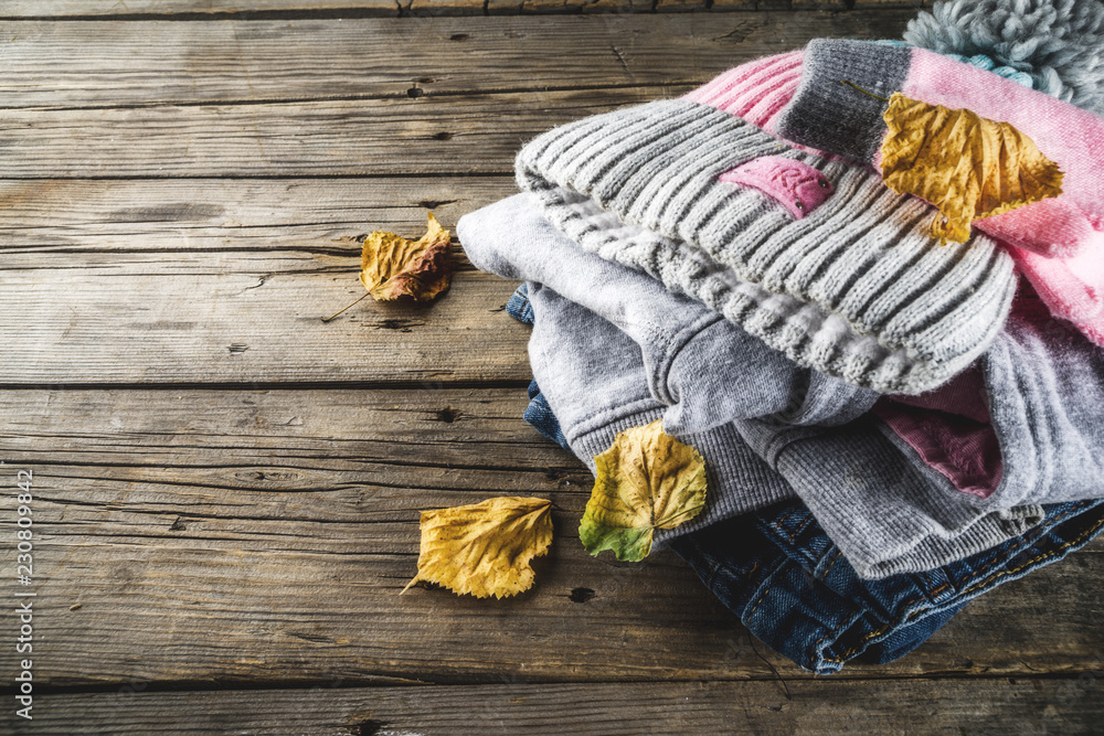 Fototapeta premium Autumn warm clothes for girl