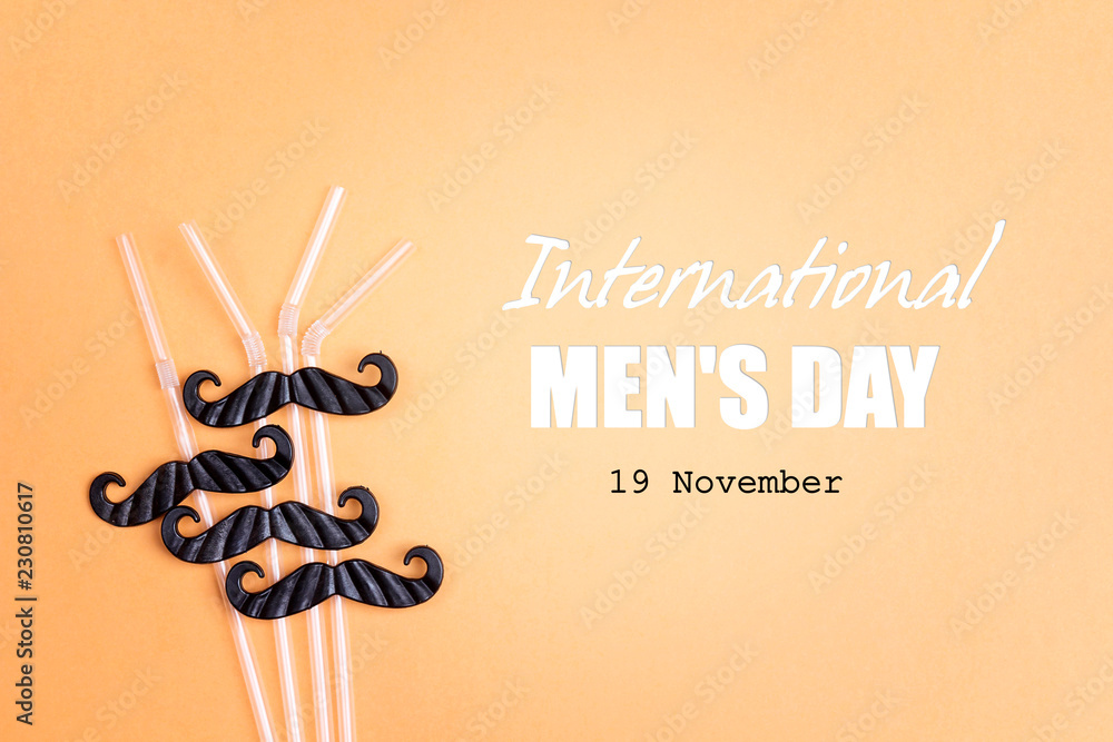 International men's day background with drinking straws for party with mustache on yellow background.