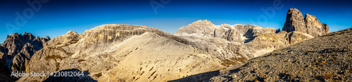 Dolomitic pass with Cima Undici and Croda dei Toni peaks panorama background South Tyrol, Italy