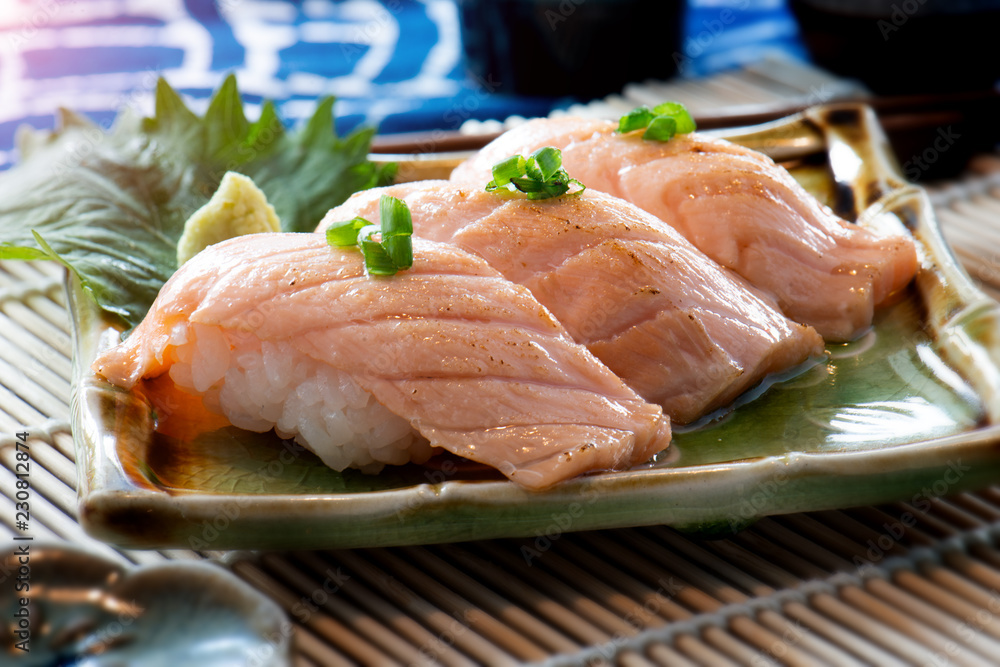 Japanese style salmon sushi .