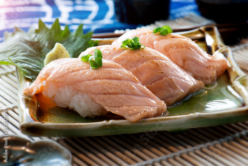 Japanese style salmon sushi .