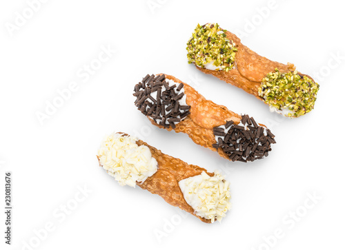 Three cannoli pastries photo