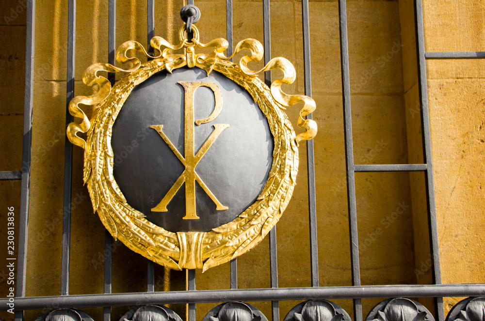 Beautiful entrance of a cemetery with Chi Roh symbol of a P and X, that ...