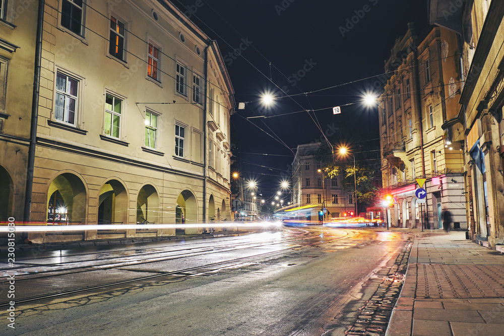 Old buildings in the historic district of Krakow at night