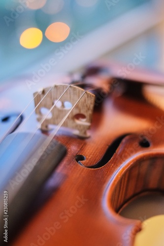 violin with blurred perspective bokeh light blue bokeh background