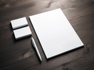 Blank corporate stationery set on wooden background. Template for branding ID.