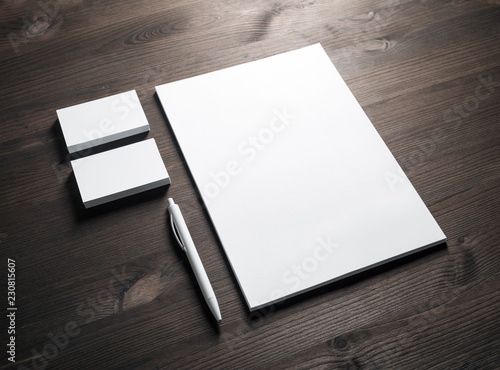Blank corporate stationery set on wooden background. Template for branding ID.
