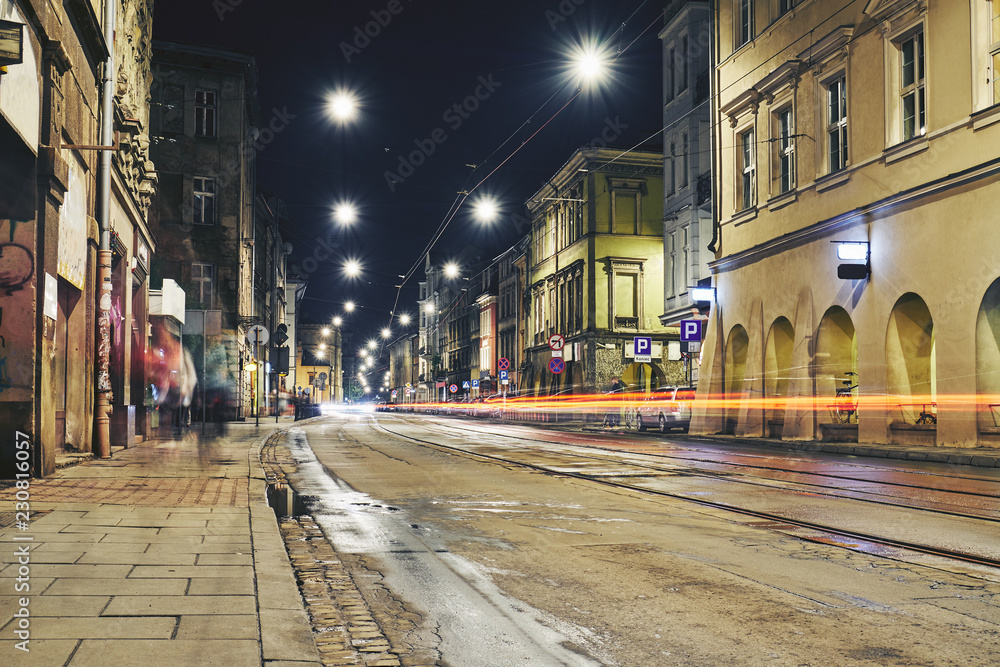 Old buildings in the historic district of Krakow at night