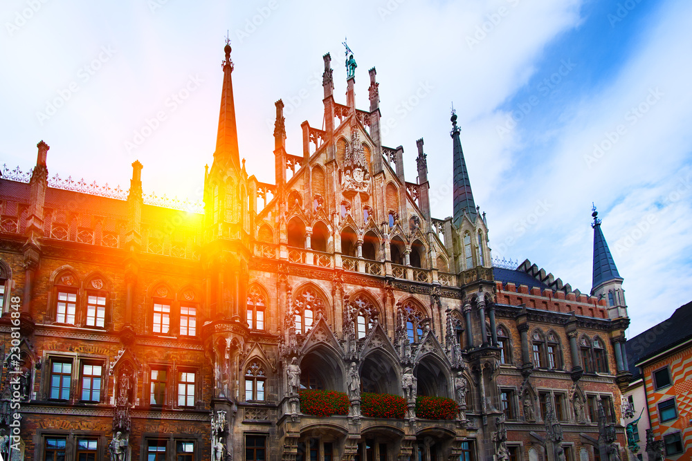Marienplatz town hall in old Munich market square in Germany on a beautiful sunny summer day