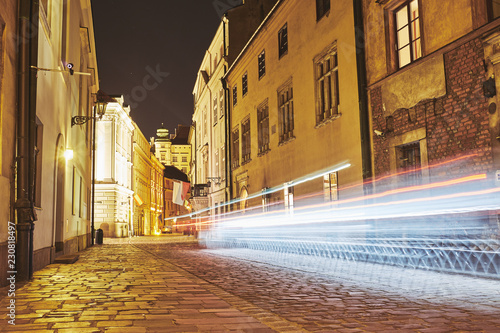 Old buildings in the historic district of Krakow at night