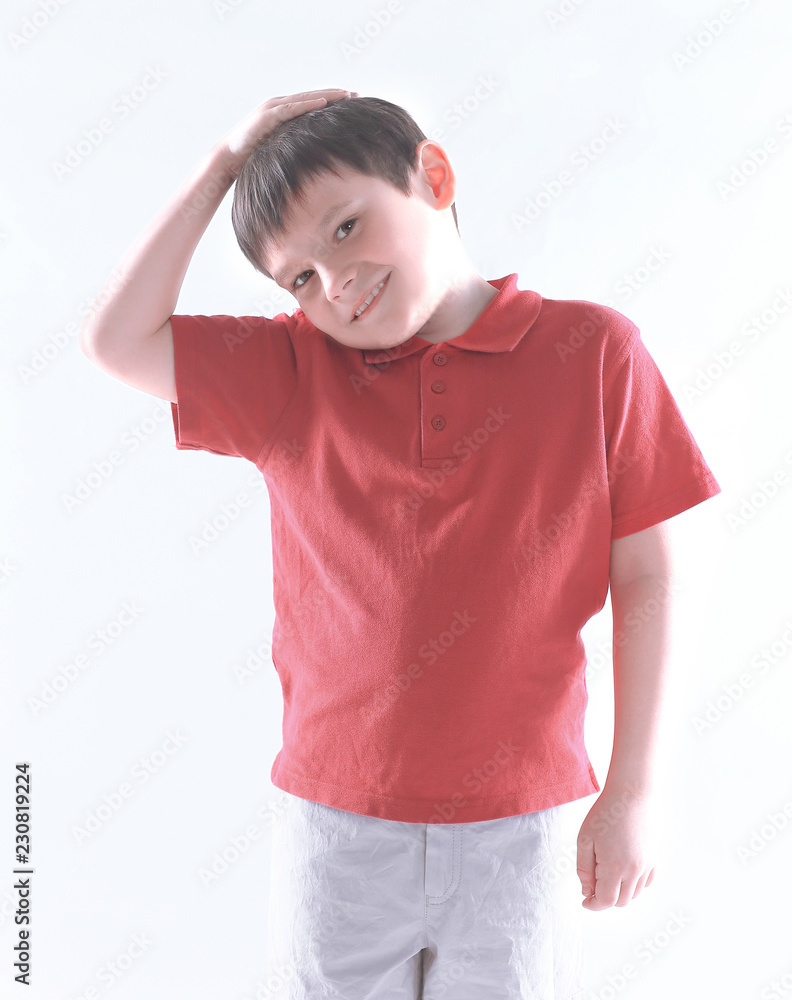 portrait of a cheerful boy in a red t-shirt.isolated on white background portrait of a cheerful boy in a red t-shirt.isolated on white background