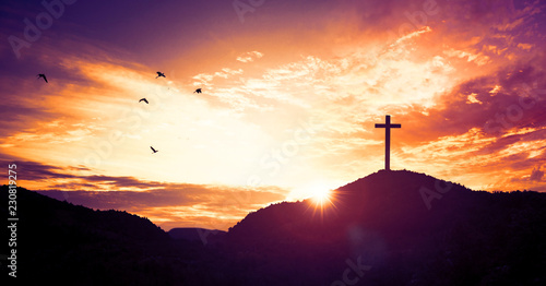 Christmas concept: Crucifixion Of Jesus Christ Cross At Sunset