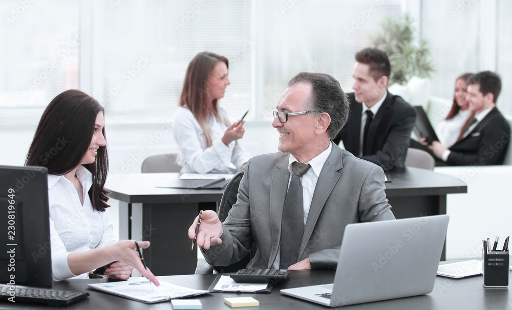 Businessman analyzing investment, budget and income charts at his workplace Businessman analyzing investment, budget and income charts at his workplace