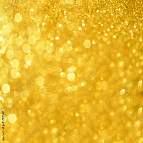 Sparkle glittering background. Square crop. Holiday abstract texture. Christmas card with copy space, gold bokeh, defocused lights.