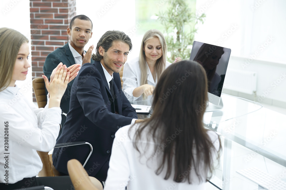 Fototapeta premium business team applauding the speaker at the workshop
