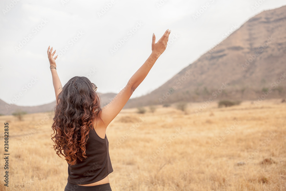 Asian girls spread their hands in the sky to show their happiness and victory with the concept of life and success on the sky in the morning. The silhouette of the girl raised her hand to thank God. Asian girls spread their hands in the sky to show their happiness and victory with the concept of life and success on the sky in the morning. The silhouette of the girl raised her hand to thank God.