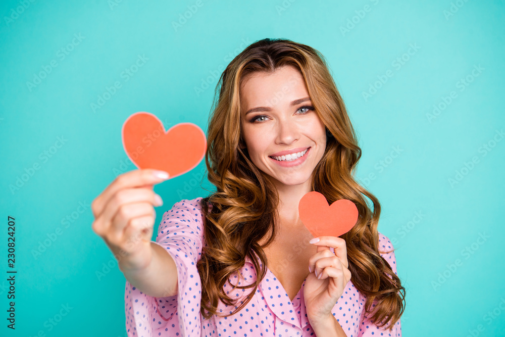 Carefree careless lady with her hairstyle she hold two small red Carefree careless lady with her hairstyle she hold two small red