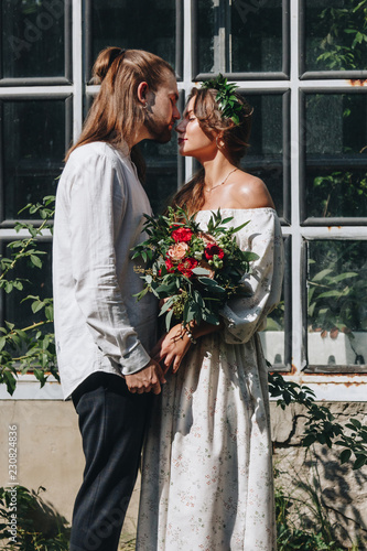 Beautiful couple in botanical garden photo