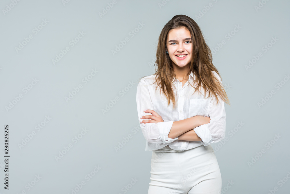 Business woman portrait with crossed arms isolated on white background Business woman portrait with crossed arms isolated on white background