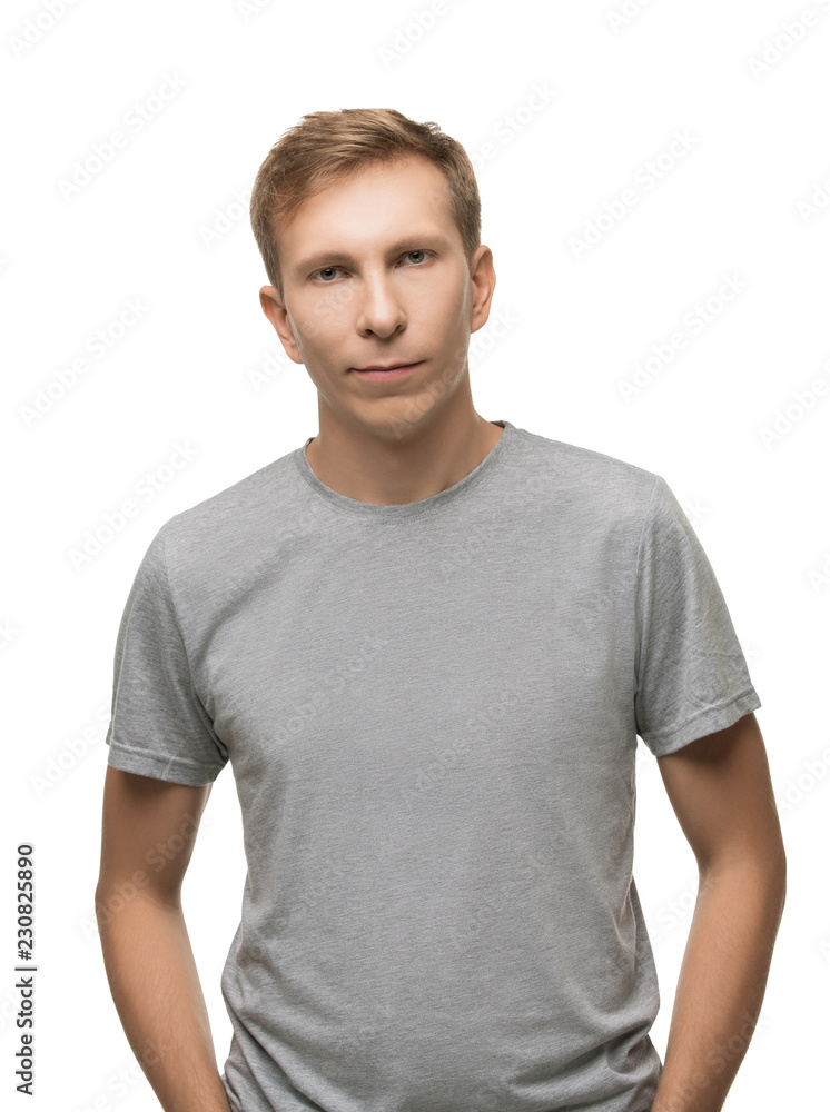 Handsome male in gray t-shirt isolated portrait Handsome male in gray t-shirt isolated portrait