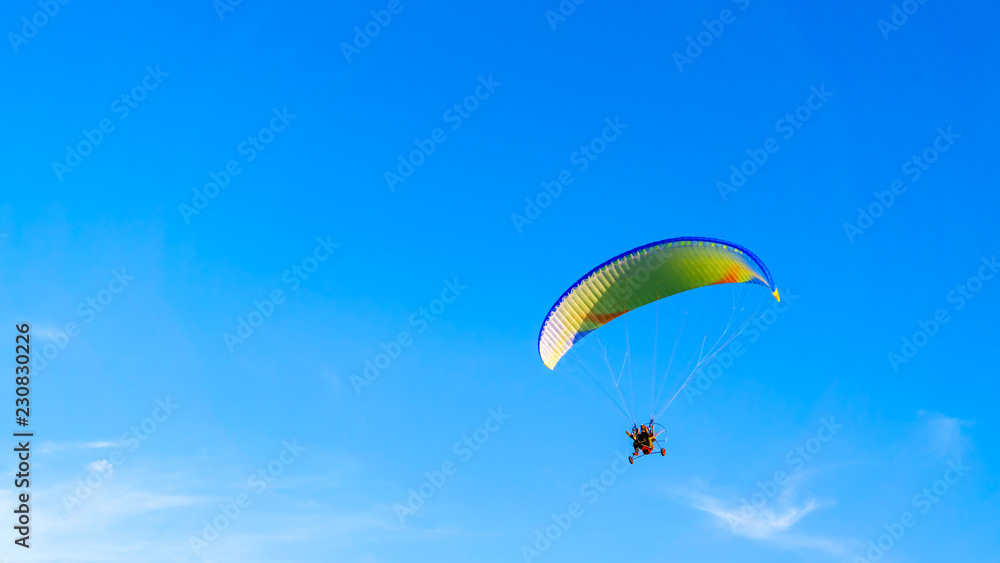 paragliding in the blue sky paragliding in the blue sky