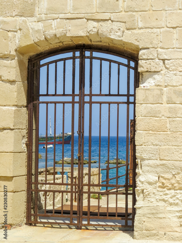 Favignana, Trapani, Italy -  view from the gate of the Former tuna fish factory (La Tonnara in Italian) in the Aegadian islands