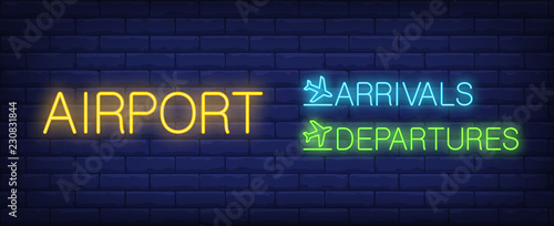 Airport with arrivals and departures inscription neon sign. Arrival and Departure lettering with airplanes. Can be used for information desk in airport, pointers, airport areas