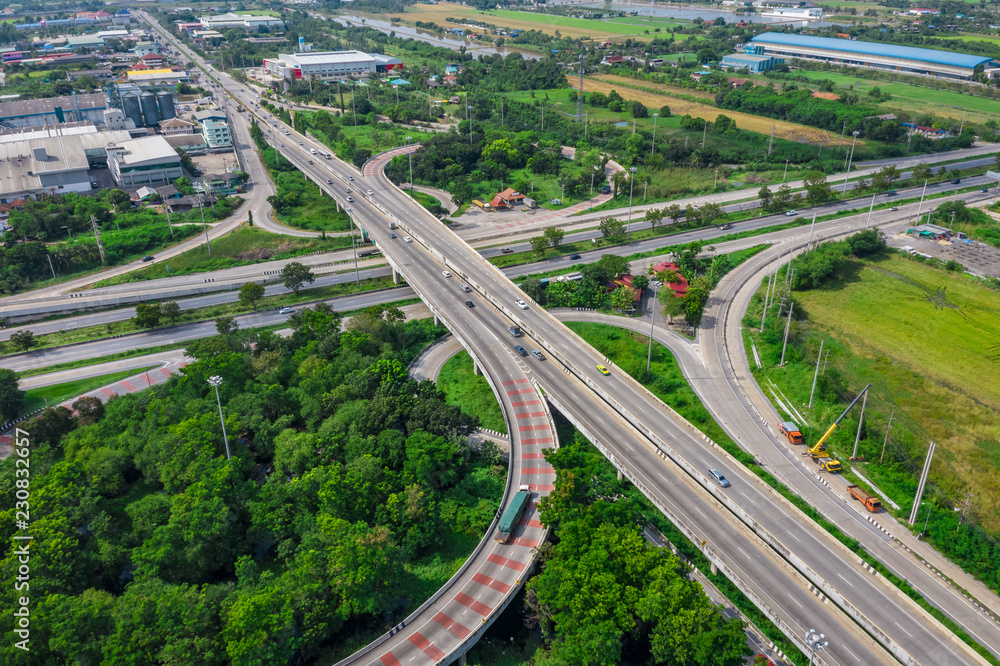 ring bridge connecting the city and freeway motorway expressway with bypass over aerial top view ring bridge connecting the city and freeway motorway expressway with bypass over aerial top view