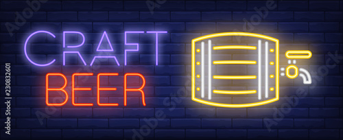 Craft beer neon sign. Glowing neon inscription with yellow beer keg. Can be used for craft beer shops, pubs, bars, advertisements