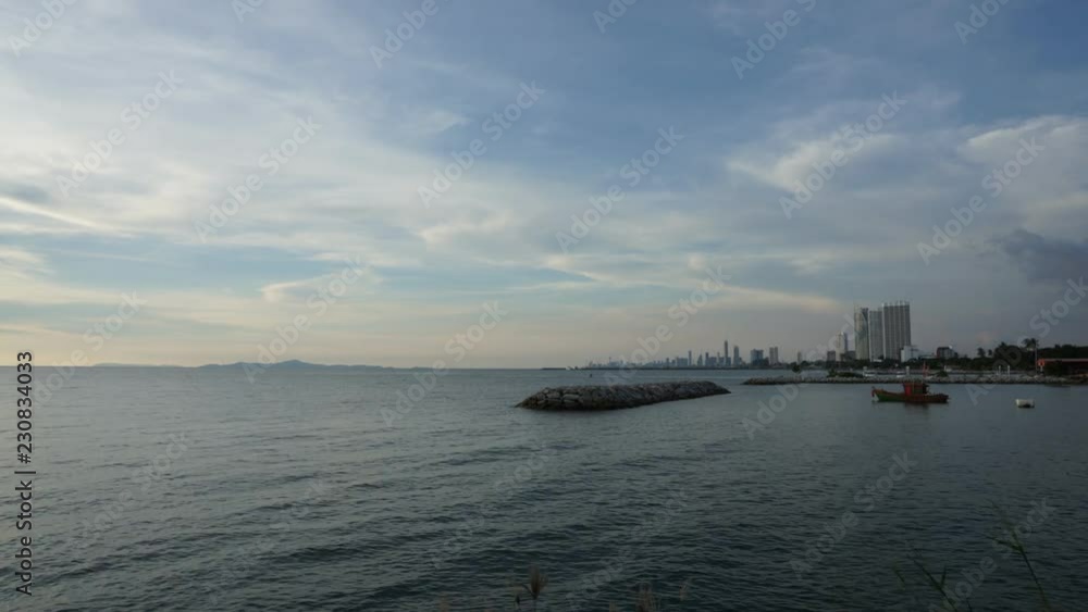 Time-lapse life of sea and blue sky with Cityscape in Thailand. Time-lapse life of sea and blue sky with Cityscape in Thailand.