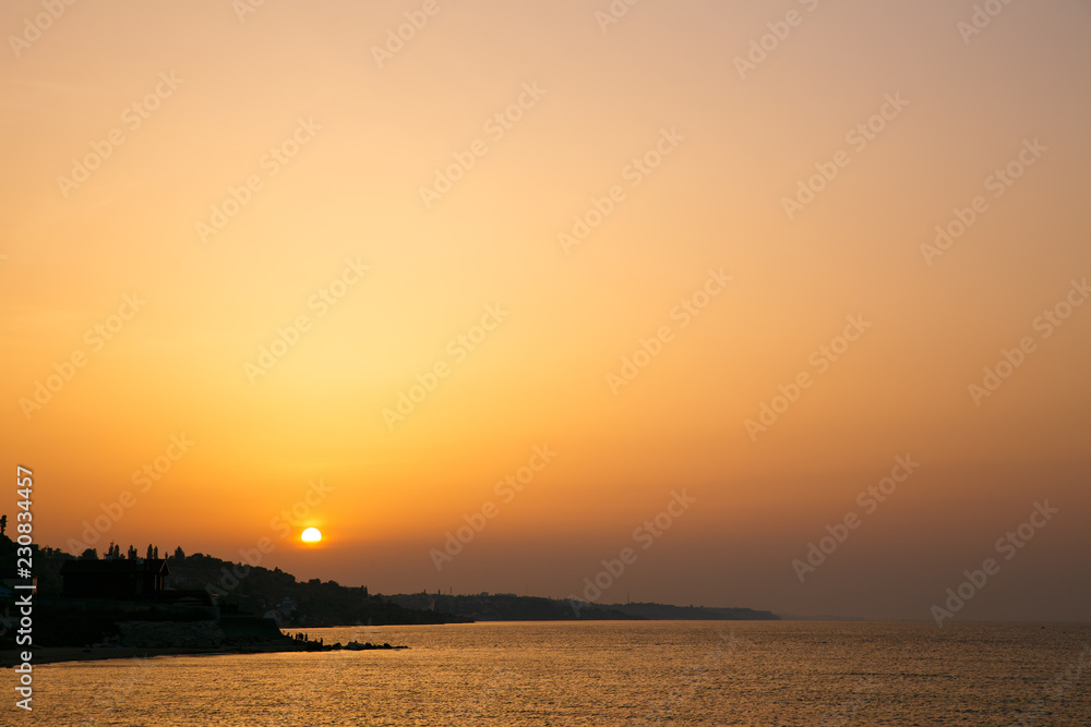 Naklejka premium sunset at the sea