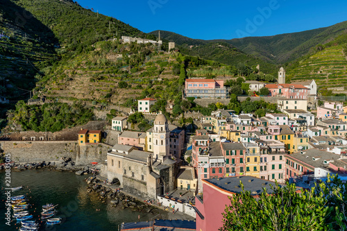 Beautiful aerial view of the center of Vernazza illuminated by the late afternoon sun, Cinque Terre, Liguria, Italy