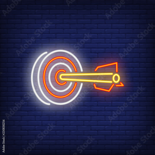 Dart in target neon sign. Illustration of dart in rad target on dark blue brick background. Can be used for topics like entertainment, games, advertisement