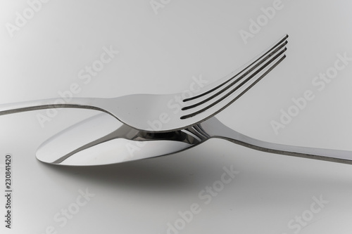 cutlery fork and spoon over white background
