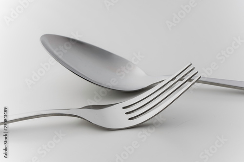 cutlery fork and spoon over white background