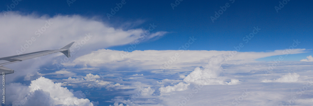 Fototapeta premium panoramic view over wide blue sky high on board