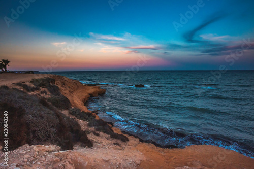 Landscape shot of Mil Palmeras seashore in the evening, Spain