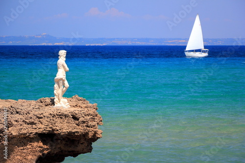 Poseidon statue. North-East coast of Zakynthos or Zante island, Ionian Sea, Greece.