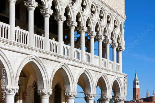 Venice  Doge palace open gallery and San Giorgio Maggiore bell tower in a sunny summer day in Italy