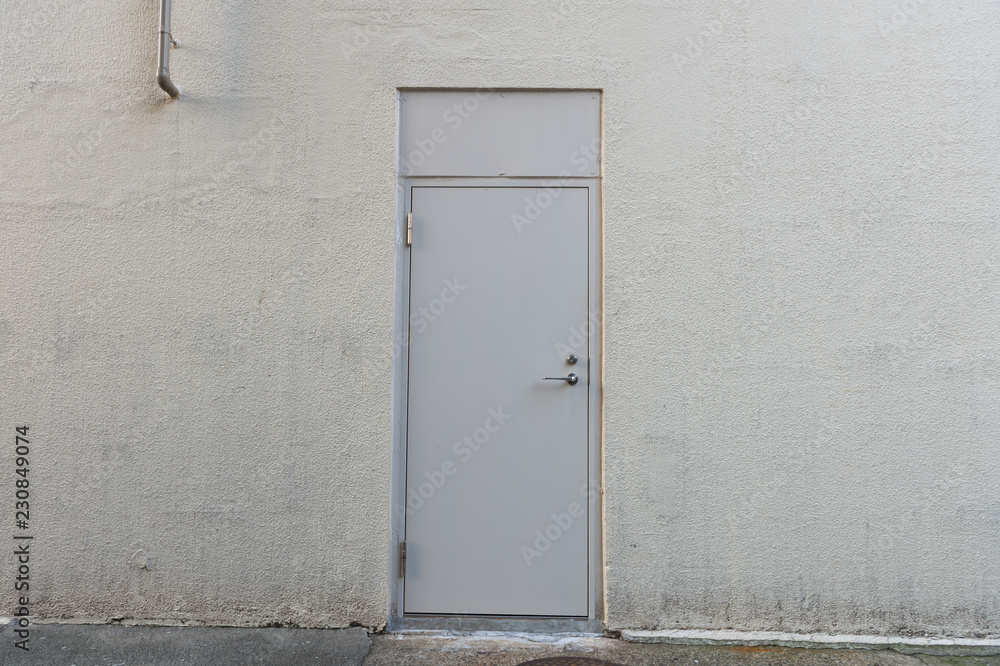 sidewalk by street wall & door sidewalk by street wall & door