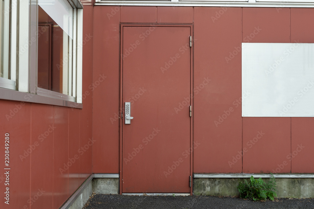 Fototapeta premium sidewalk by street wall & door