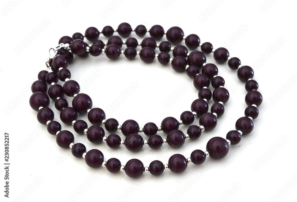 natural material lady's bead closeup isolated on white natural material lady's bead closeup isolated on white