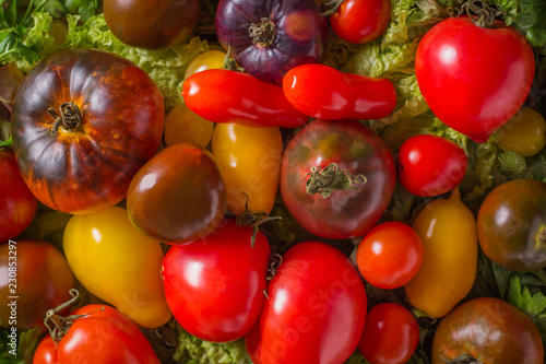 Fresh heirloom tomatoes colorfull background  organic produce