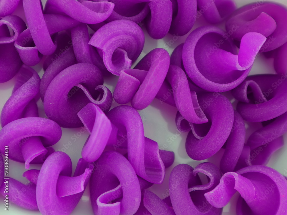 Colored pasta on a plate. Macro shooting. Colored pasta on a plate. Macro shooting.